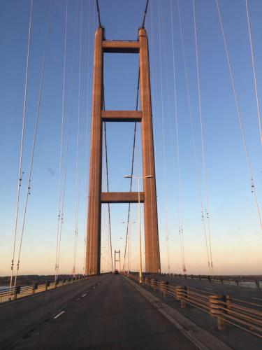 a bridge over a highway with the sky in the background at OurHaus in Beverley
