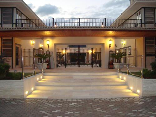 a courtyard of a building with lights on it at Don Quixote Pousada in Tiradentes