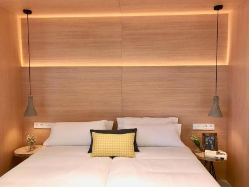 Cama o camas de una habitación en Inside Bilbao Apartments