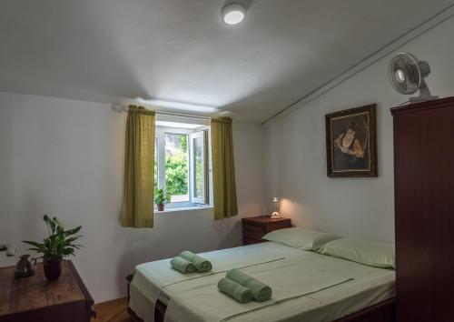 Posteľ alebo postele v izbe v ubytovaní Apartment Matijas