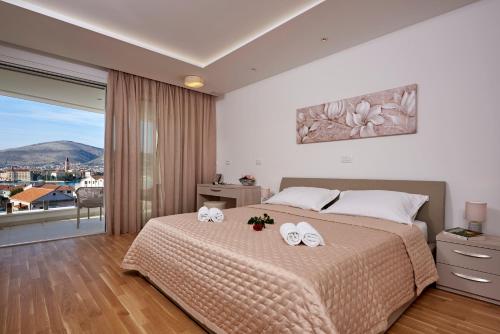 Ένα ή περισσότερα κρεβάτια σε δωμάτιο στο Villa Trogir