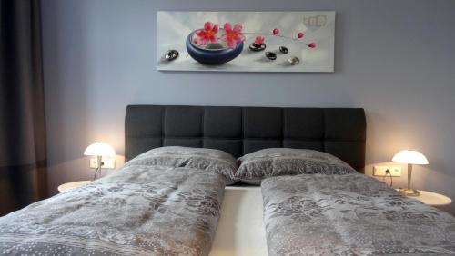 Кровать или кровати в номере Sonnberg Design Apartment