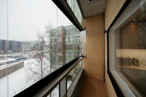 a view of a balcony from a building with awindow at Lootsi 3a Nordic Style with Parking in Tallinn
