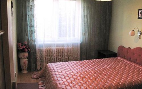 
Ein Bett oder Betten in einem Zimmer der Unterkunft Pension Harmony
