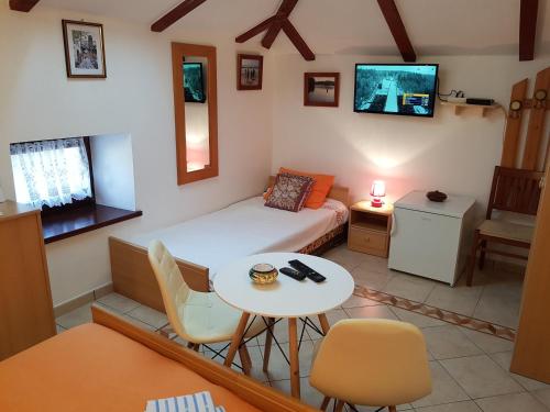 Μια τηλεόραση ή/και κέντρο ψυχαγωγίας στο Apartment Noemi