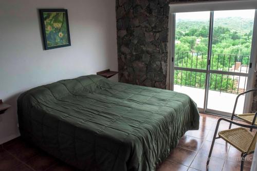 En eller flere senge i et værelse på Cabañas Alma de Pueblo, Mayu Sumaj