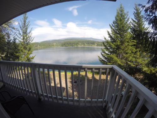 a view of a lake from a balcony at Jasper Way Inn Resort & Campground in Clearwater