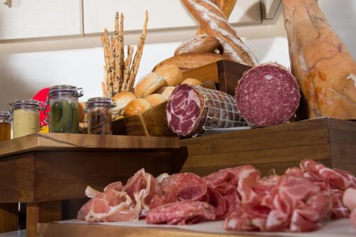 a box filled with different types of meats and bread at Lancaster Bangkok in Bangkok