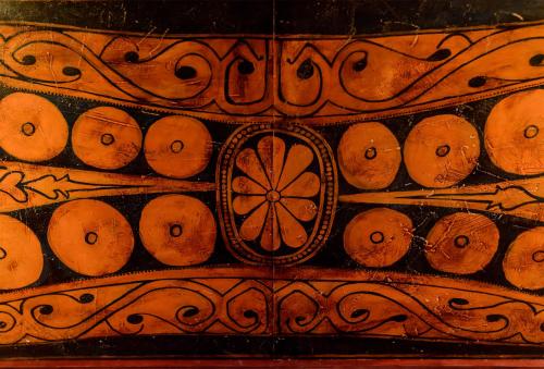a wooden wall with a clock on it at Hotel La Casueña in Lanuza