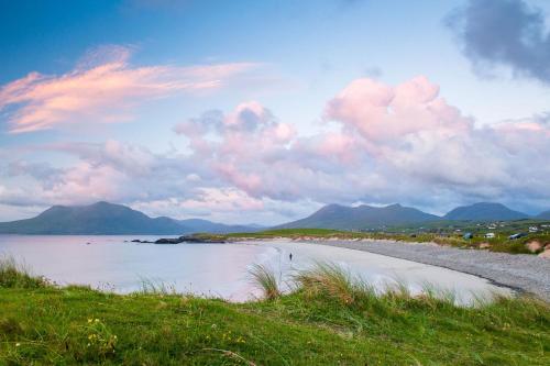 a view of a beach with mountains in the background at Cottage 259 - Renvyle in Renvyle