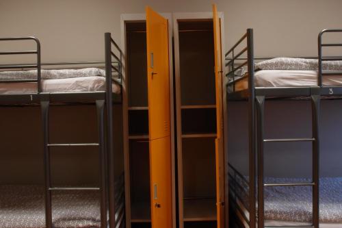 a group of bunk beds in a dorm room at Liberty Airy in Rīga