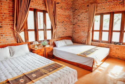 Ένα ή περισσότερα κρεβάτια σε δωμάτιο στο Ninh Binh Friendly Homestay