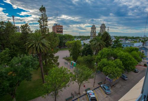 an aerial view of a city with trees and cars at Gran Hotel Flores in Trinidad