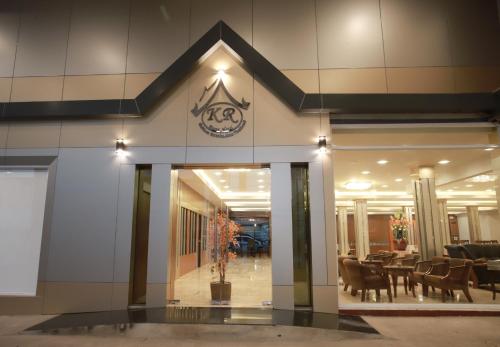 a lobby of a building with chairs and tables at Korat Hotel - SHA Plus in Nakhon Ratchasima