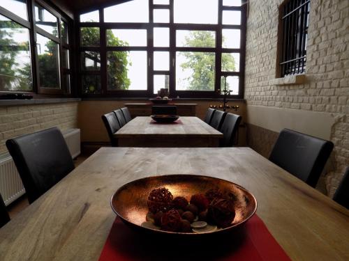 a bowl of food on a table in a room at Vakantiehuis Charmant in Brakel