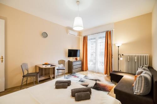 Postel nebo postele na pokoji v ubytování BpR Orange Dream Apartment