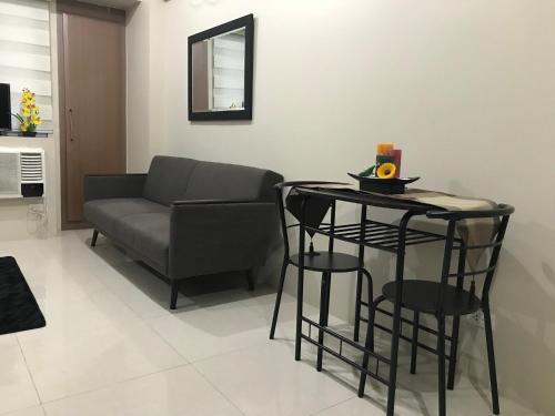 Area soggiorno di One Palm Tree Apartments