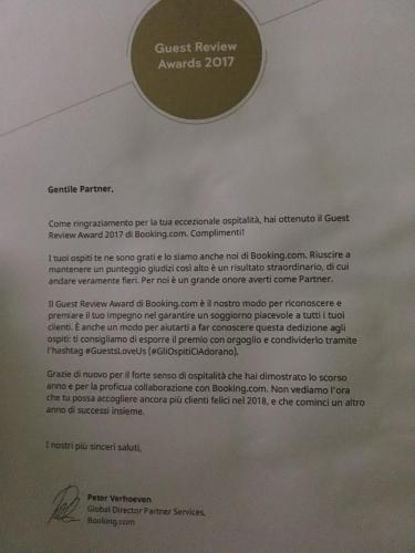 a piece of paper on top of a document at Guest House Ohrid Trpeski in Ohrid