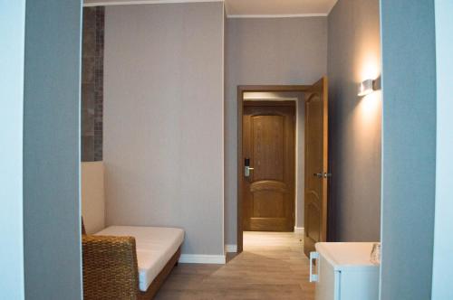Кровать или кровати в номере Pallada Hotel
