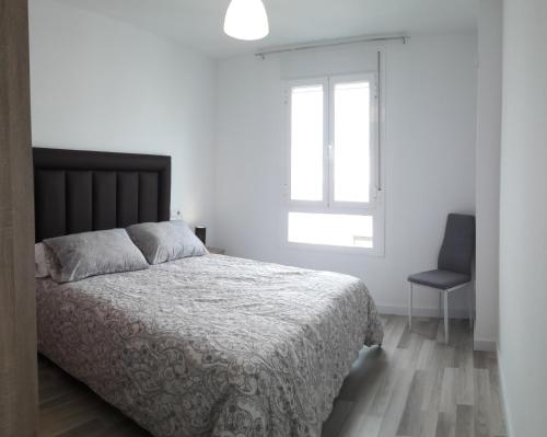 Postel nebo postele na pokoji v ubytování Wallada Damasco