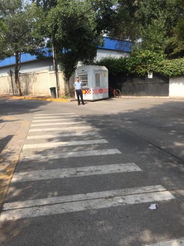 a man standing in the middle of a street at Rent apart Las Condes in Santiago