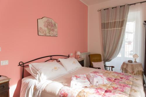 Postel nebo postele na pokoji v ubytování B&B" del Castello"