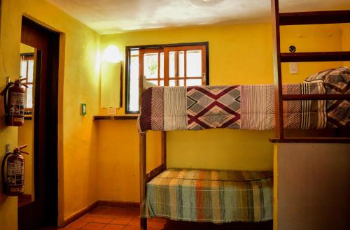 Casa Grande Hostelにあるベッド