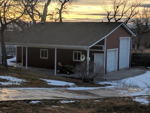 a house with a car parked in front of it at DIA BnB - We love workers in Brighton