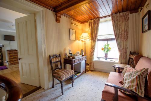 Zona de estar de Brennan's Accommodation Glenties
