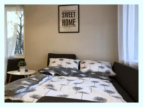 Posteľ alebo postele v izbe v ubytovaní Apartament przy Ratuszu