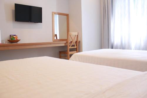 Ένα ή περισσότερα κρεβάτια σε δωμάτιο στο Ly Ky Hotel 2