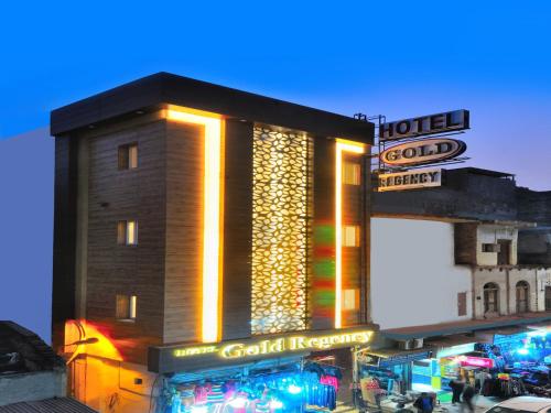 a hotel building with lights on the side of it at The Gold Regency - 02 Mins from New Delhi Railway Station in New Delhi