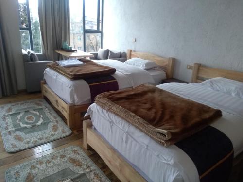 Katil atau katil-katil dalam bilik di Jacky's Guesthouse