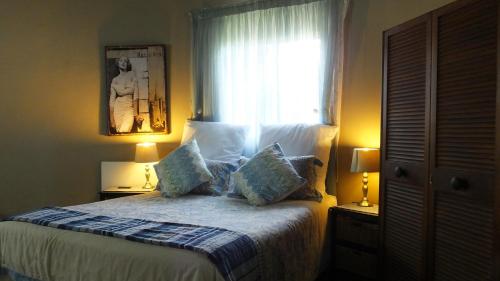 Ένα ή περισσότερα κρεβάτια σε δωμάτιο στο Dublin Guest House