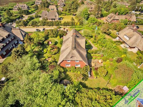 an aerial view of a house with a roof at Landhaus Kroghooger Wai in Kampen