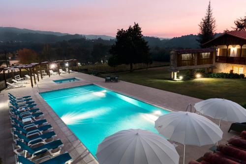 Utsikt över poolen vid Quinta do Burgo - Nature Hotel eller i närheten