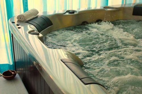 a large pool of water with waves in it at Grand Hotel Dei Cavalieri in Maruggio