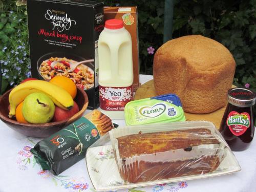 a table topped with food and a jug of milk at The Stable in Eastleigh
