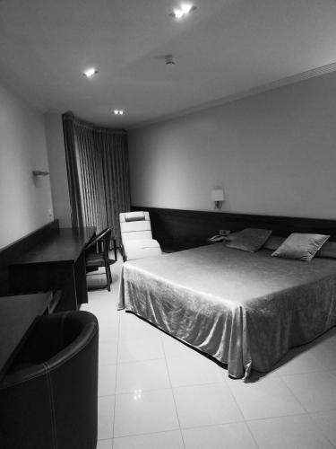 Кровать или кровати в номере Hotel Els Noguers