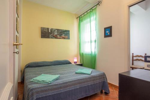 Ένα ή περισσότερα κρεβάτια σε δωμάτιο στο Casa Ibiscus x2