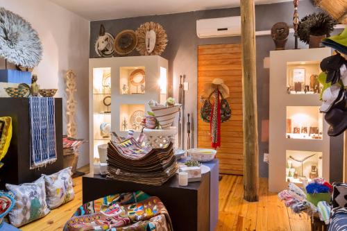 a room filled with lots of items on display at Victoria Falls River Lodge in Victoria Falls