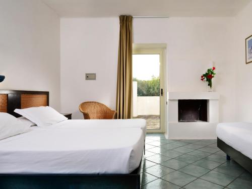 Postel nebo postele na pokoji v ubytování TH Ostuni - Ostuni Village