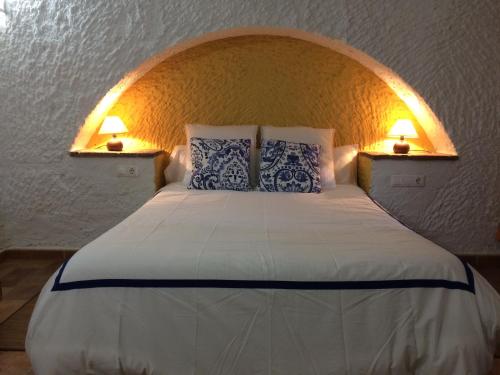 Cama o camas de una habitación en Cuevas Hammam Abuelo Jose
