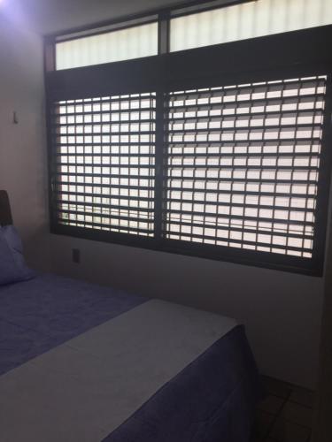 Una cama o camas en una habitación de O Portuga Pousada