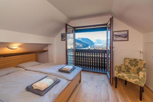 Postel nebo postele na pokoji v ubytování Villa Bohinca