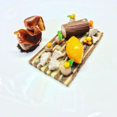 a group of miniature food items on a table at Köpfers Steinbuck in Bischoffingen