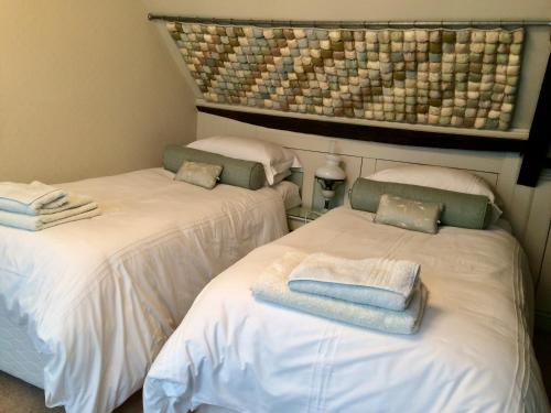 Voodi või voodid majutusasutuse Waterside Cottage Bed and Breakfast toas