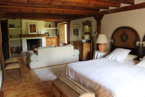 Postel nebo postele na pokoji v ubytování Exclusiva Casa Rustica