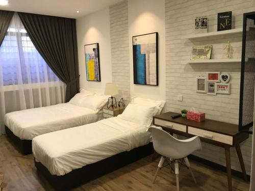 Postel nebo postele na pokoji v ubytování W boutique 10pax with family karaoke