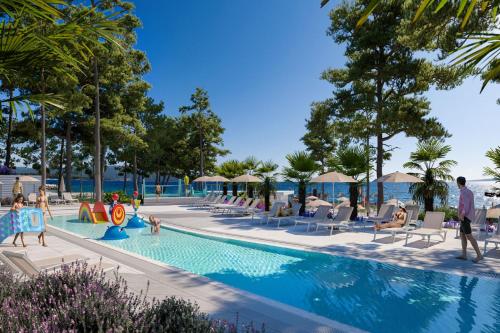 an image of a swimming pool at a resort at Valamar Camping Ježevac in Krk